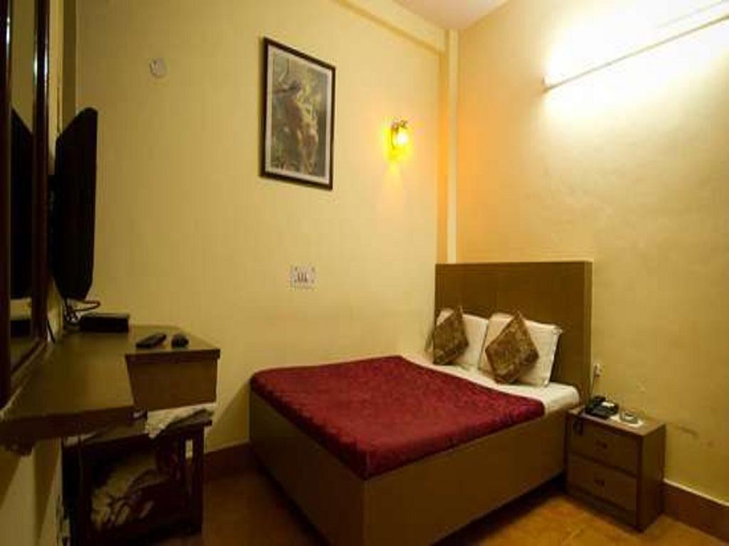 Hotel Woodland Deluxe Νέο Δελχί Δωμάτιο φωτογραφία